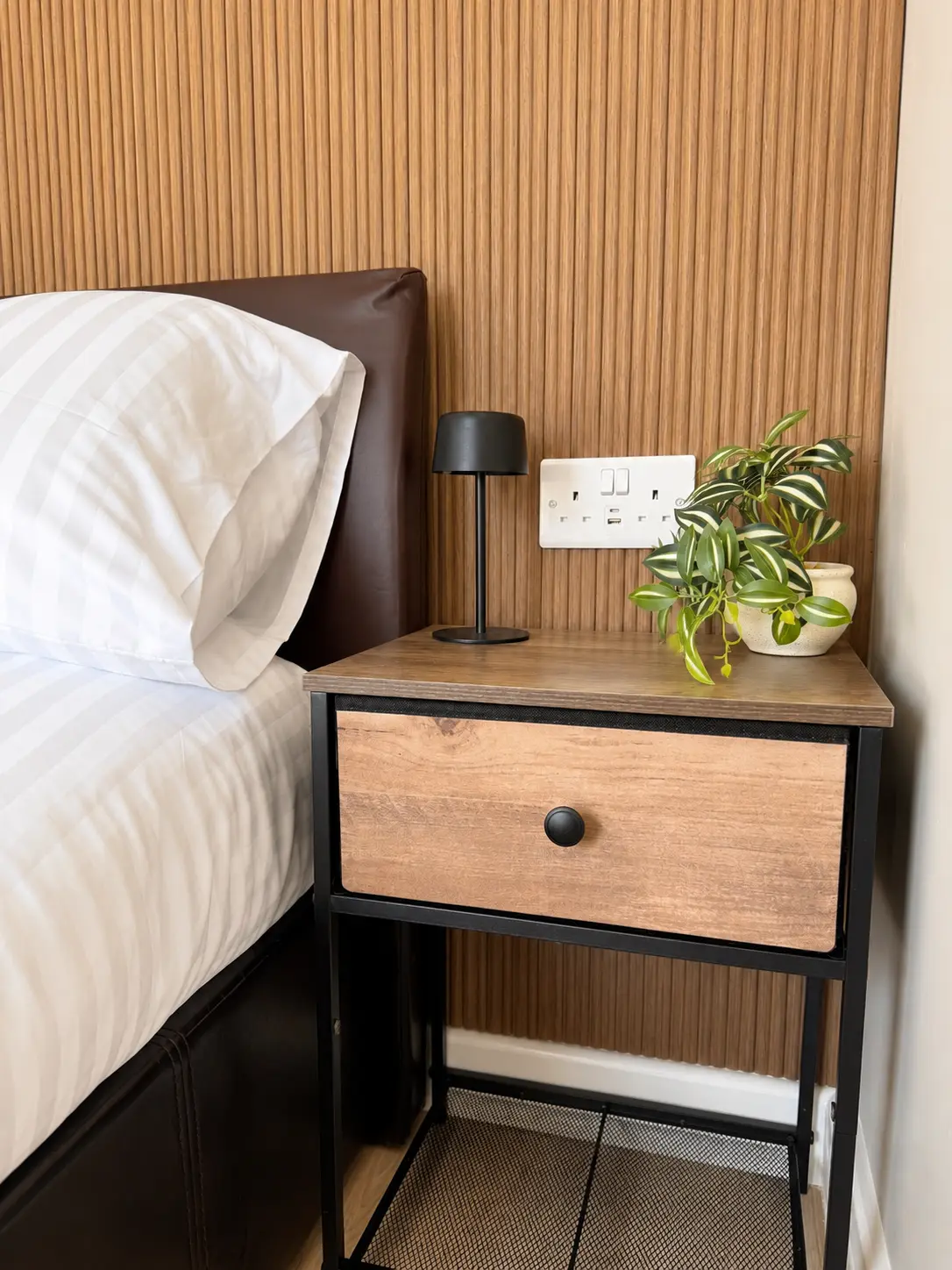 Bedside detail in the second upstairs bedroom at the Wellingborough Luxury Staycation