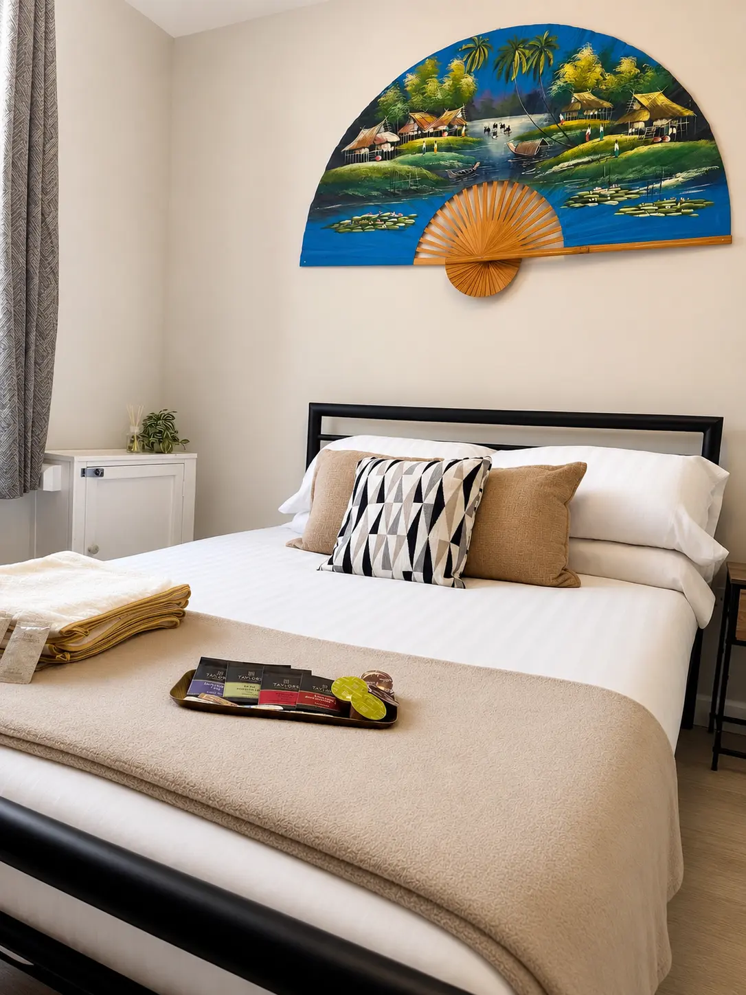 Downstairs bedroom with double bed and hotel grade linen at the Wellingborough Luxury Staycation